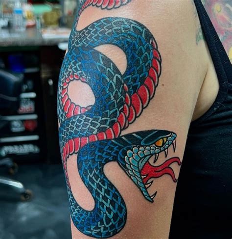 14 Snake Tattoo Meanings + Serpent & Ouroboros。